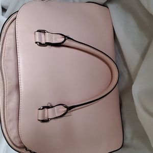 Pink handbag with zipper compartments